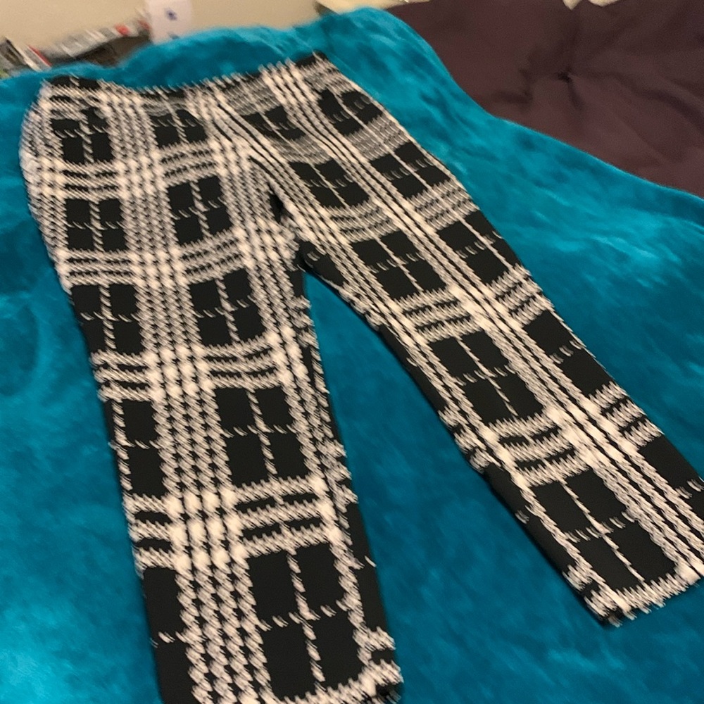 Black and white plaid pants.